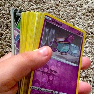 27 Pokémon cards and ,V Pokémon card